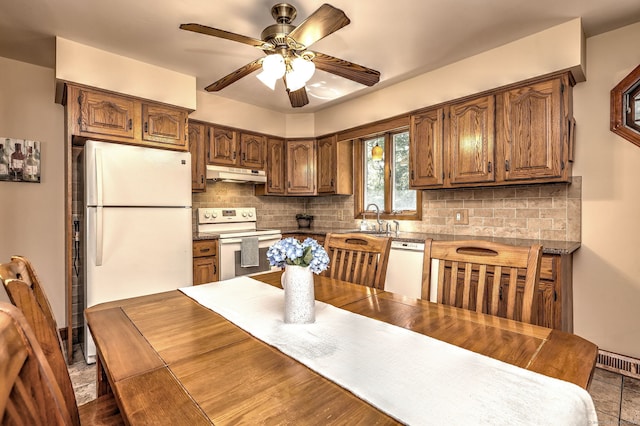 55 Mary Ellen Dr, Milford, CT 06460 - kitchen featuring white appliances, under cabinet range hood, a ceiling fan, and backsplash