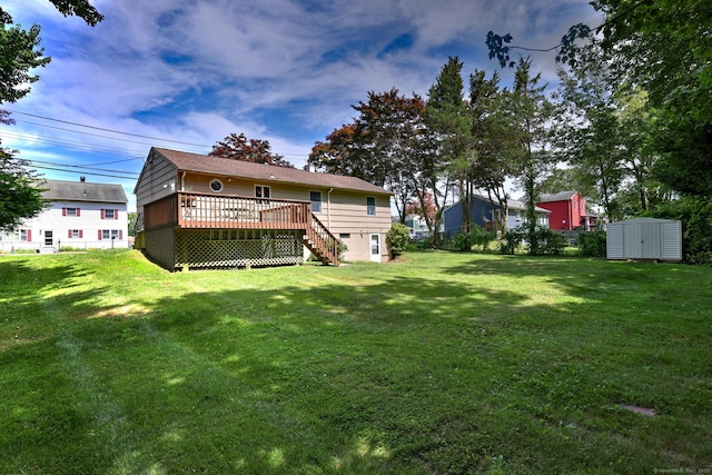 55 Mary Ellen Dr, Milford, CT 06460 - rear view of property with a shed, a deck, stairway, and a yard