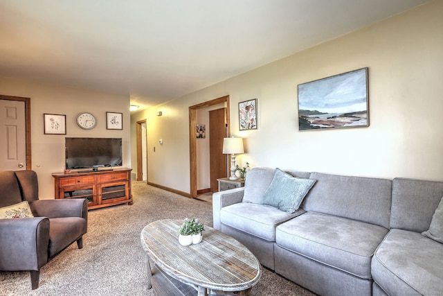 55 Mary Ellen Dr, Milford, CT 06460 - living area with light carpet and baseboards