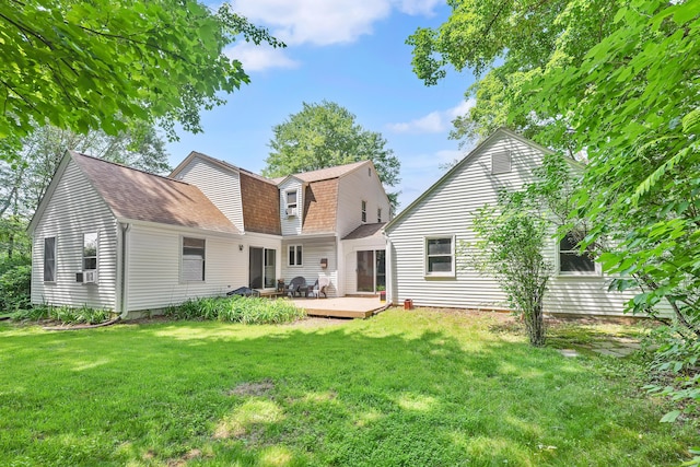 108 Pilgrim Dr, Windsor, CT 06095 - back of property featuring a shingled roof, a lawn, and a wooden deck