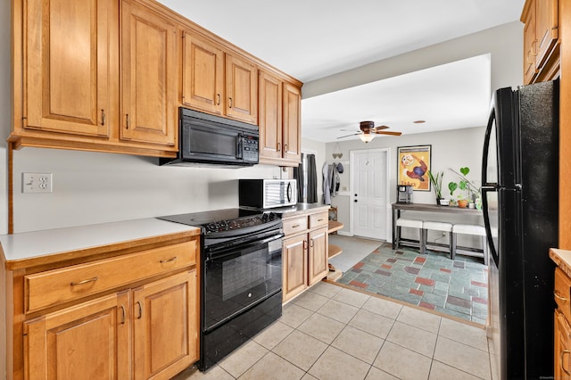 108 Pilgrim Dr, Windsor, CT 06095 - kitchen with black appliances, light countertops, ceiling fan, and light tile patterned floors