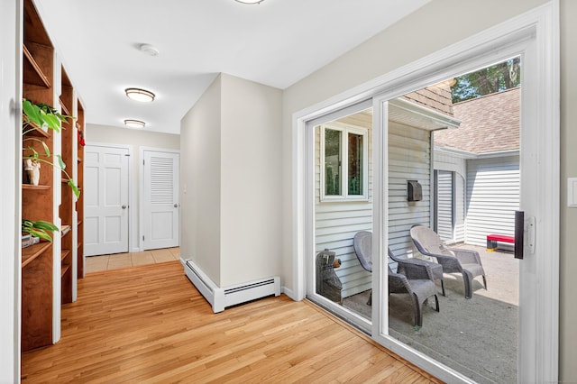 108 Pilgrim Dr, Windsor, CT 06095 - hall with baseboard heating and light wood-type flooring