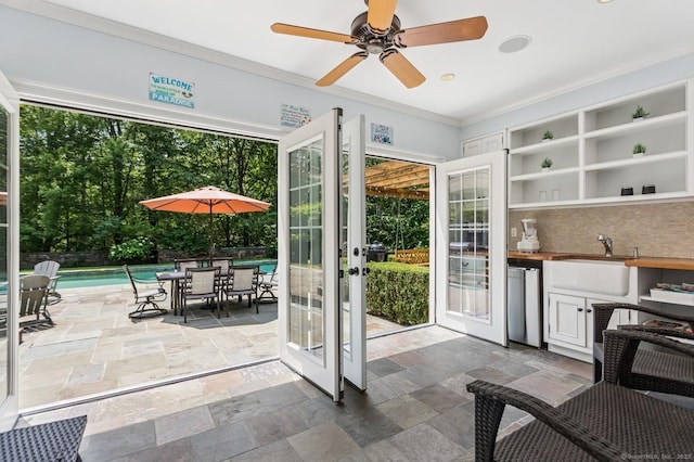 47 Tubbs Spring Dr, Weston, CT 06883 - entryway with stone tile floors, crown molding, french doors, and a ceiling fan