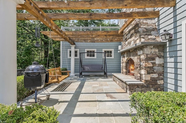 47 Tubbs Spring Dr, Weston, CT 06883 - view of patio / terrace featuring an outdoor stone fireplace and a pergola