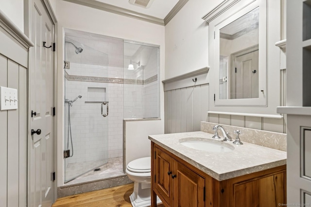 47 Tubbs Spring Dr, Weston, CT 06883 - full bath featuring ornamental molding, vanity, a stall shower, wood finished floors, and wainscoting