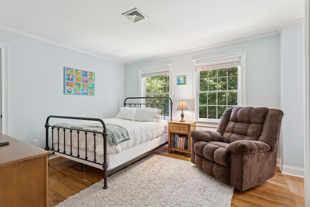 47 Tubbs Spring Dr, Weston, CT 06883 - bedroom with crown molding and light wood-type flooring