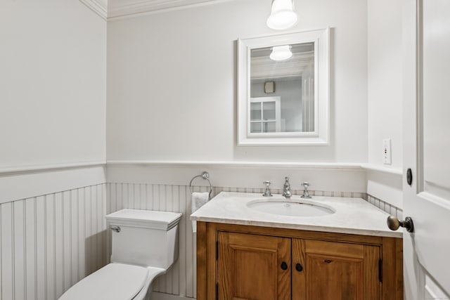 47 Tubbs Spring Dr, Weston, CT 06883 - bathroom with vanity, wainscoting, and crown molding