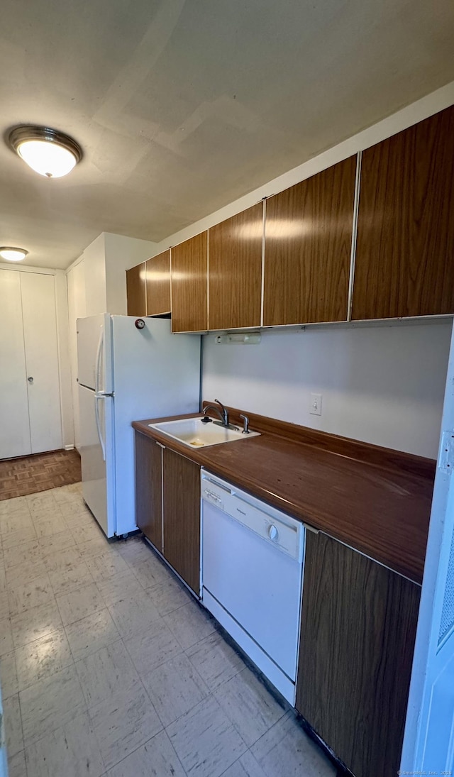 31 Woodland St Unit 7F, Hartford, CT 06103 - kitchen featuring white dishwasher and light floors