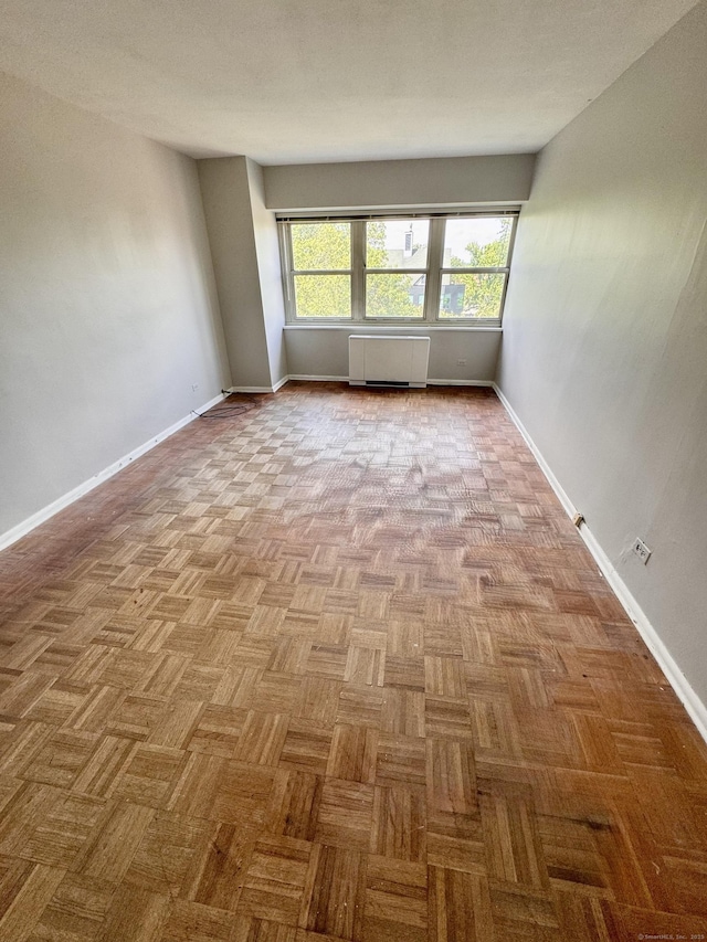 31 Woodland St Unit 7F, Hartford, CT 06103 - unfurnished room featuring radiator heating unit and baseboards