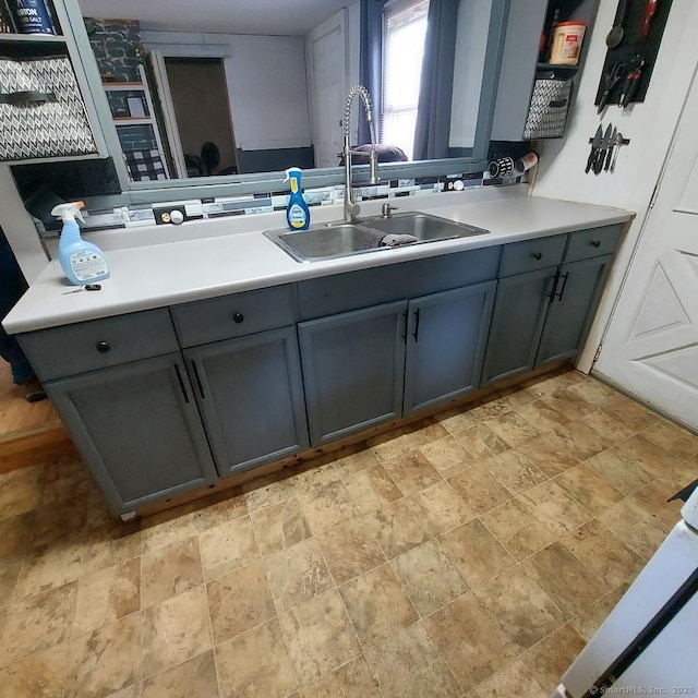 3 Prospect Pl, Middletown, CT 06457 - kitchen featuring gray cabinets, stone finish flooring, light countertops, and open shelves