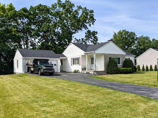 5 Greenfield Dr, Ansonia, CT 06401 - single story home featuring driveway, a garage, a front yard, and stone siding
