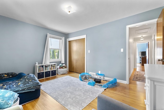 5 Greenfield Dr, Ansonia, CT 06401 - bedroom featuring attic access, wood finished floors, and a closet