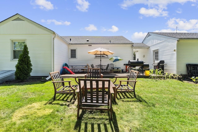 5 Greenfield Dr, Ansonia, CT 06401 - view of green lawn featuring a patio area and outdoor dining area