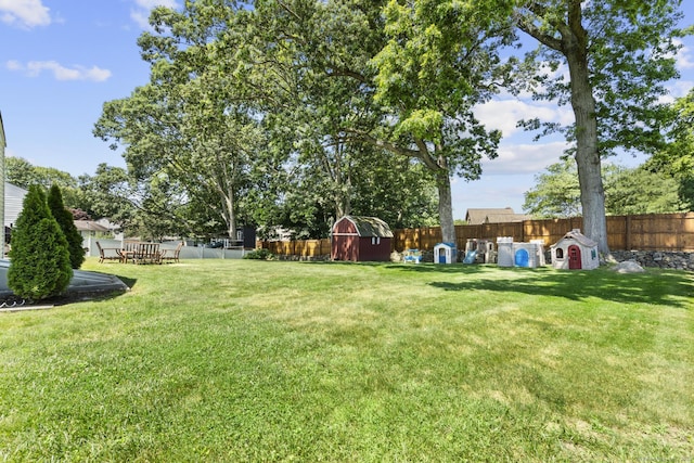5 Greenfield Dr, Ansonia, CT 06401 - fenced backyard with a storage unit