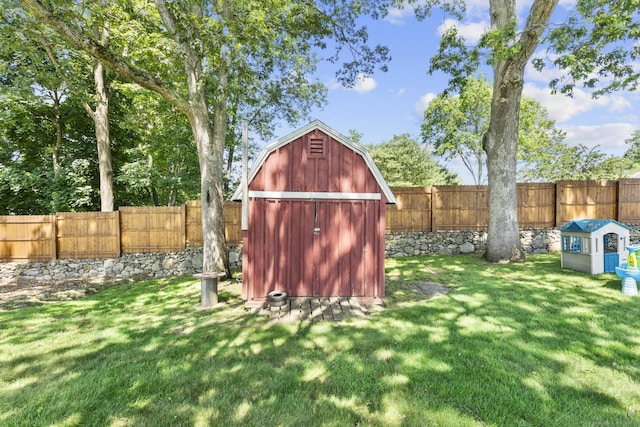 5 Greenfield Dr, Ansonia, CT 06401 - fenced backyard with a storage unit