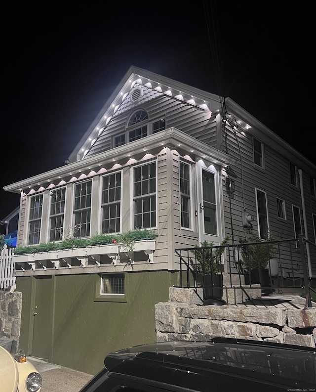 28 Grand St, New London, CT 06320 - view of property exterior at twilight