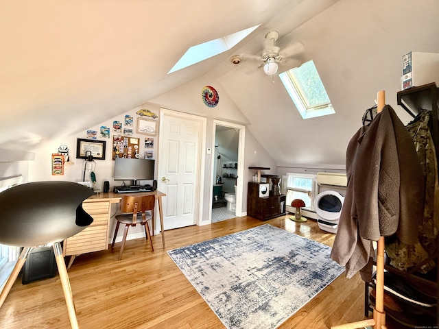 28 Grand St, New London, CT 06320 - office space with a skylight, ceiling fan, vaulted ceiling, wood finished floors, and baseboard heating