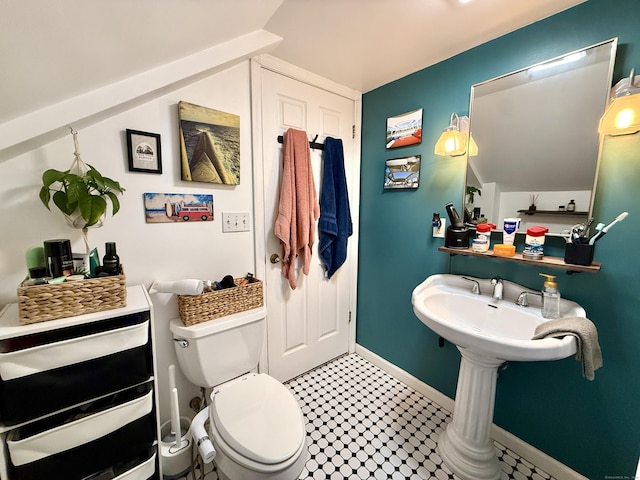 28 Grand St, New London, CT 06320 - half bathroom with toilet and tile patterned floors
