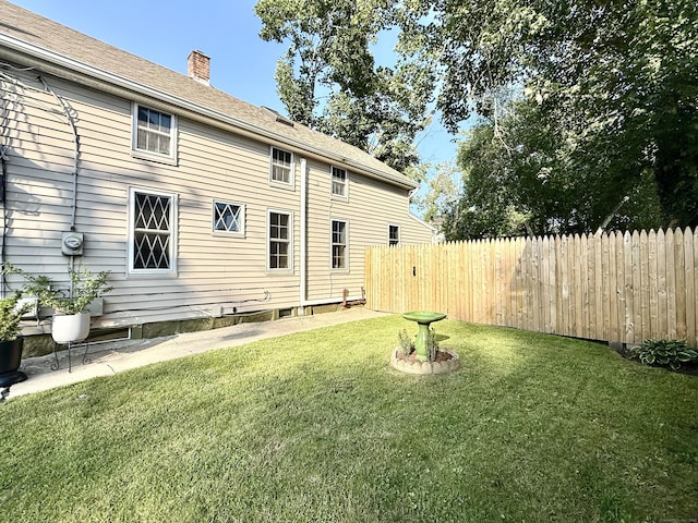 28 Grand St, New London, CT 06320 - rear view of house with a chimney