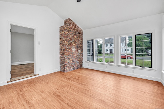 108 Adams St, New Britain, CT 06052 - spare room with lofted ceiling and light wood-style flooring