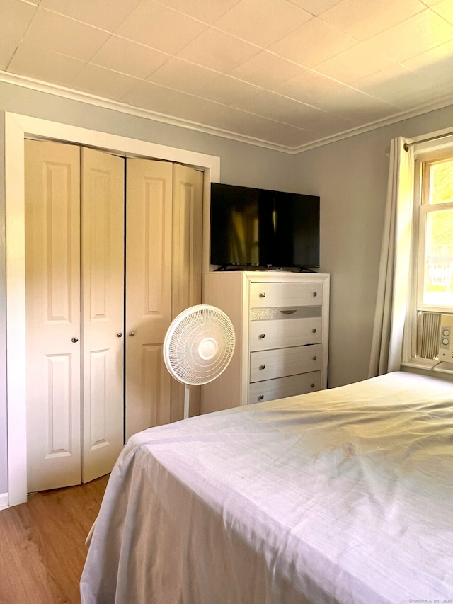 30 Roulin St, Torrington, CT 06790 - bedroom featuring a closet, wood finished floors, and ornamental molding