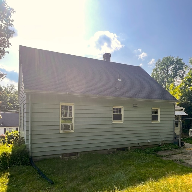 30 Roulin St, Torrington, CT 06790 - back of house with a chimney and cooling unit