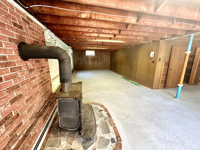 191 Prospect Hill Rd, Groton, CT 06340 - unfinished basement with a wood stove