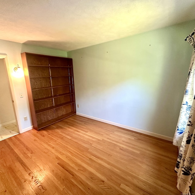 191 Prospect Hill Rd, Groton, CT 06340 - unfurnished bedroom with light wood-style floors and baseboards