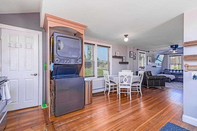 8 Johnson St, Stonington, CT 06379 - kitchen with stacked washer / dryer, hardwood / wood-style flooring, a ceiling fan, and plenty of natural light