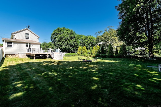 8 Johnson St, Stonington, CT 06379 - view of yard featuring a deck and a fire pit