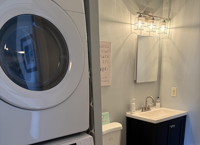 111 Dekoven Dr Apt 1008, Middletown, CT 06457 - bathroom featuring vanity and estacked washer and dryer