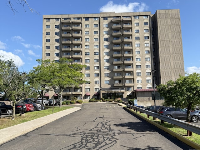 111 Dekoven Dr Apt 1008, Middletown, CT 06457 - view of apartment building / complex featuring uncovered parking
