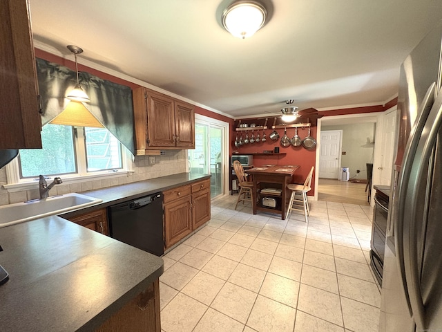 109 Middle Rd, Enfield, CT 06082 - kitchen with black dishwasher, dark countertops, range, freestanding refrigerator, and light tile patterned flooring