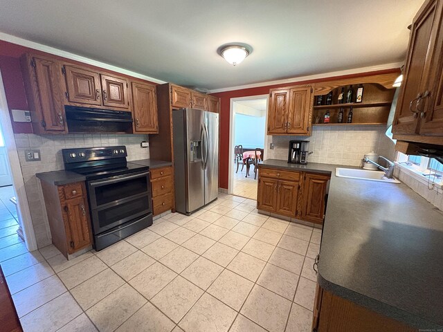 109 Middle Rd, Enfield, CT 06082 - kitchen featuring stainless steel appliances, extractor fan, tasteful backsplash, light tile patterned floors, and dark countertops