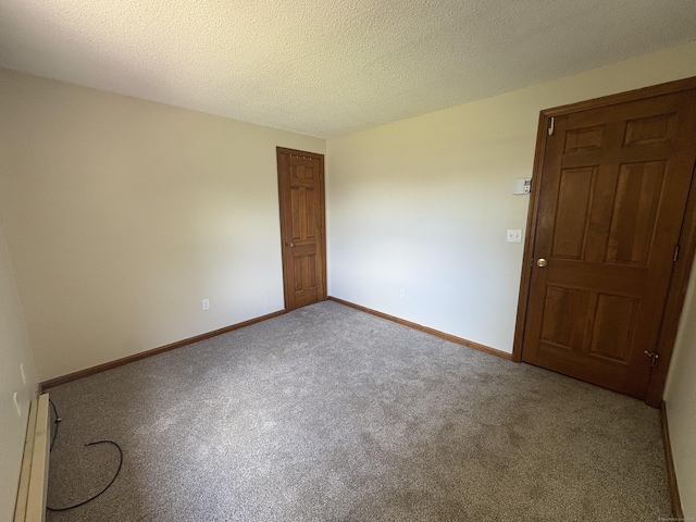 109 Middle Rd, Enfield, CT 06082 - carpeted empty room with a baseboard radiator and a textured ceiling