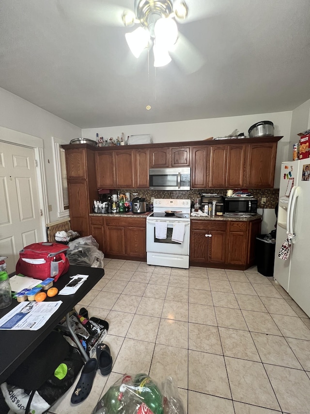 70 Burnham St, Hartford, CT 06112 - kitchen featuring white appliances, tasteful backsplash, ceiling fan, and light tile patterned floors