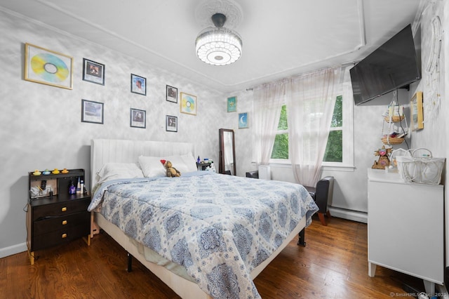 1996 Straits Tpke, Middlebury, CT 06762 - bedroom with a baseboard heating unit and dark wood-style flooring