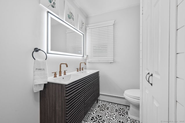 1996 Straits Tpke, Middlebury, CT 06762 - bathroom with a baseboard radiator, double vanity, and tile patterned flooring