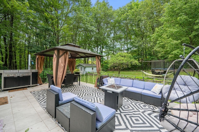 1996 Straits Tpke, Middlebury, CT 06762 - view of patio featuring an outdoor living space with a fire pit, a gazebo, and view of scattered trees