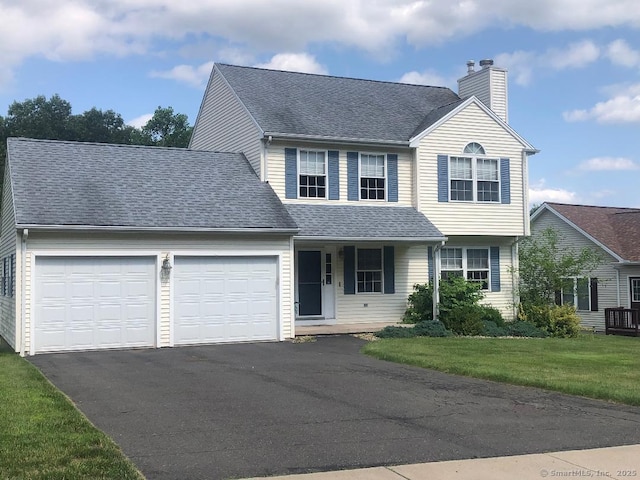 126 Sunnydale Ave, Bristol, CT 06010 - traditional home featuring a garage, driveway, a chimney, a front yard, and covered porch