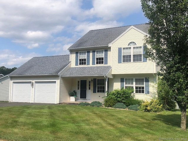 126 Sunnydale Ave, Bristol, CT 06010 - view of front of home featuring an attached garage, a front lawn, asphalt driveway, a porch, and a shingled roof
