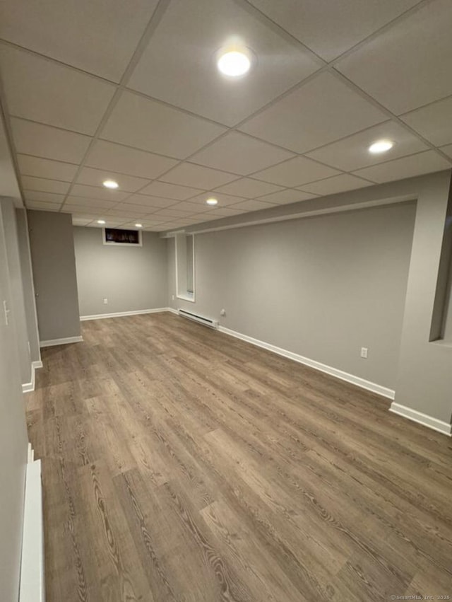 126 Sunnydale Ave, Bristol, CT 06010 - finished below grade area featuring wood finished floors, recessed lighting, and a paneled ceiling