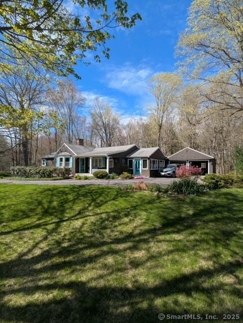 574 Cutlers Farm Rd, Monroe, CT 06468 - ranch-style house with a chimney and a front lawn