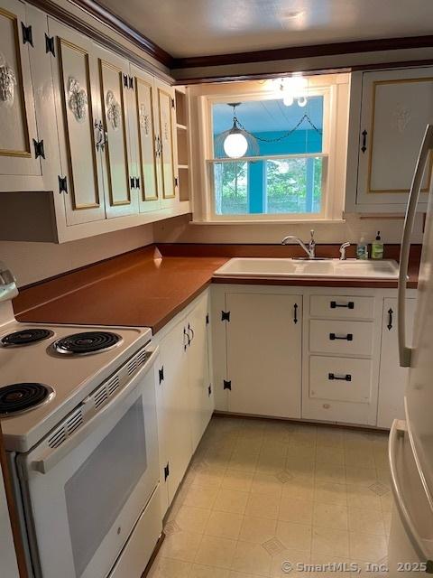 574 Cutlers Farm Rd, Monroe, CT 06468 - kitchen featuring white appliances, white cabinetry, and open shelves