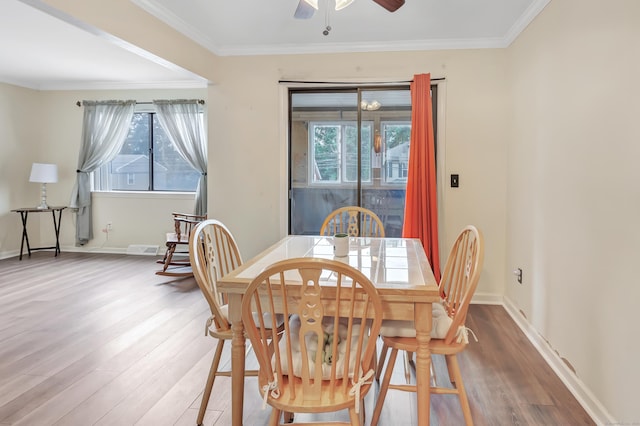 233 Derby Ave Unit 103, Derby, CT 06418 - dining area featuring wood finished floors, ceiling fan, and crown molding