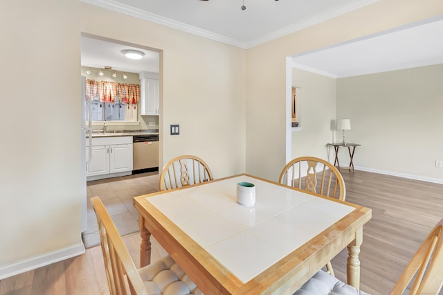 233 Derby Ave Unit 103, Derby, CT 06418 - dining area with light wood-type flooring and ornamental molding