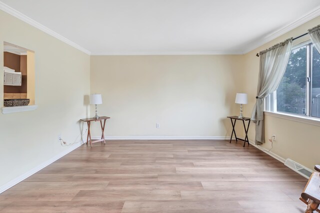 233 Derby Ave Unit 103, Derby, CT 06418 - unfurnished room with crown molding and light wood-style flooring