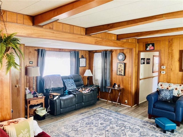44 Cheyenne Rd, East Hartford, CT 06118 - living area with beam ceiling, wood finished floors, and wood walls