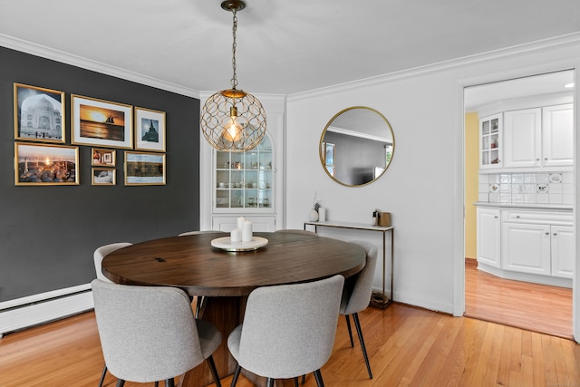 1981 Asylum Ave, West Hartford, CT 06117 - dining area featuring light wood-style flooring, crown molding, and baseboard heating