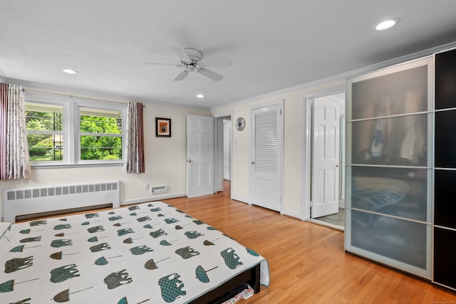 1981 Asylum Ave, West Hartford, CT 06117 - bedroom with radiator, light wood-style floors, recessed lighting, crown molding, and a ceiling fan
